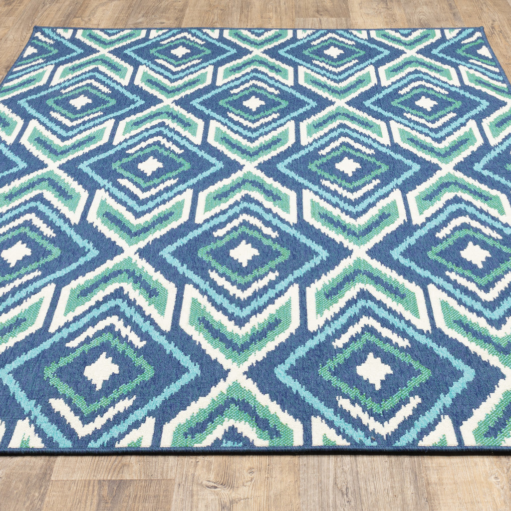 2' X 3' Blue and Ivory Geometric Stain Resistant Indoor Outdoor Area Rug