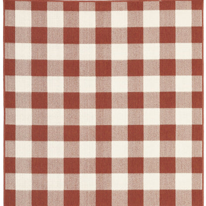 7' X 10' Red and Ivory Geometric Stain Resistant Indoor Outdoor Area Rug