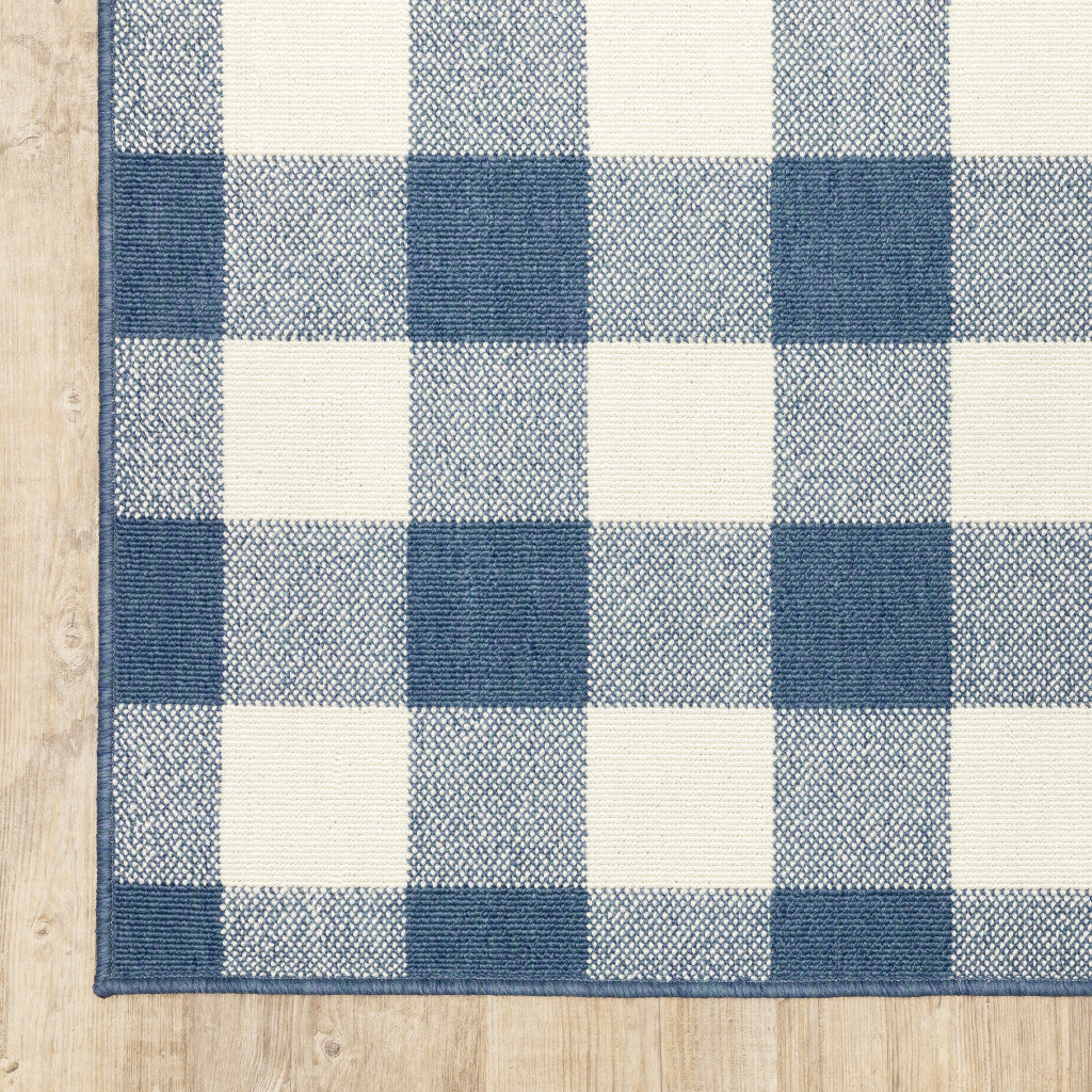 2' X 8' Blue and Ivory Geometric Stain Resistant Indoor Outdoor Area Rug