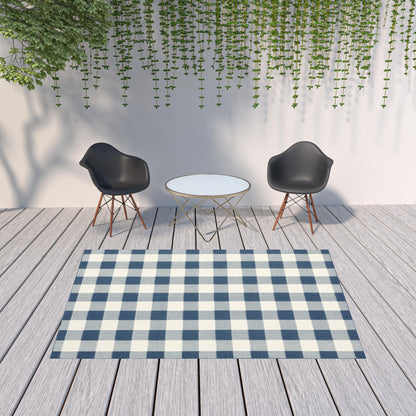 7' X 10' Blue and Ivory Geometric Stain Resistant Indoor Outdoor Area Rug