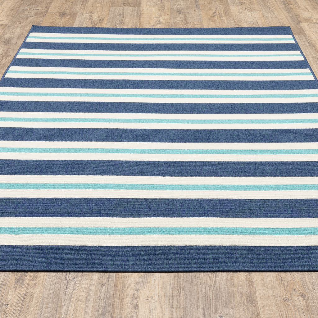 4' X 6' Blue and Ivory Geometric Stain Resistant Indoor Outdoor Area Rug