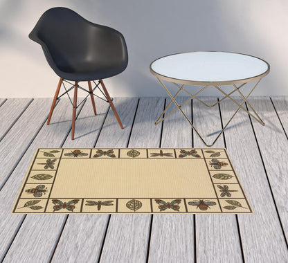 2' X 4' Brown and Ivory Abstract Stain Resistant Indoor Outdoor Area Rug