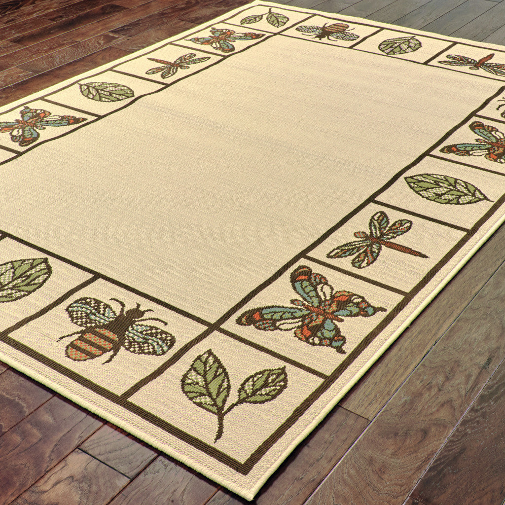 4' X 6' Brown and Ivory Abstract Stain Resistant Indoor Outdoor Area Rug