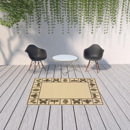 5' X 8' Brown and Ivory Abstract Stain Resistant Indoor Outdoor Area Rug