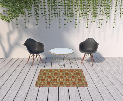 4' X 6' Brown and Ivory Floral Stain Resistant Indoor Outdoor Area Rug