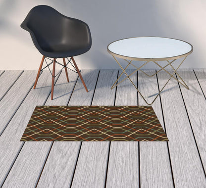 2' X 4' Brown and Ivory Geometric Stain Resistant Indoor Outdoor Area Rug