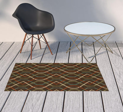 2' X 4' Brown and Ivory Geometric Stain Resistant Indoor Outdoor Area Rug