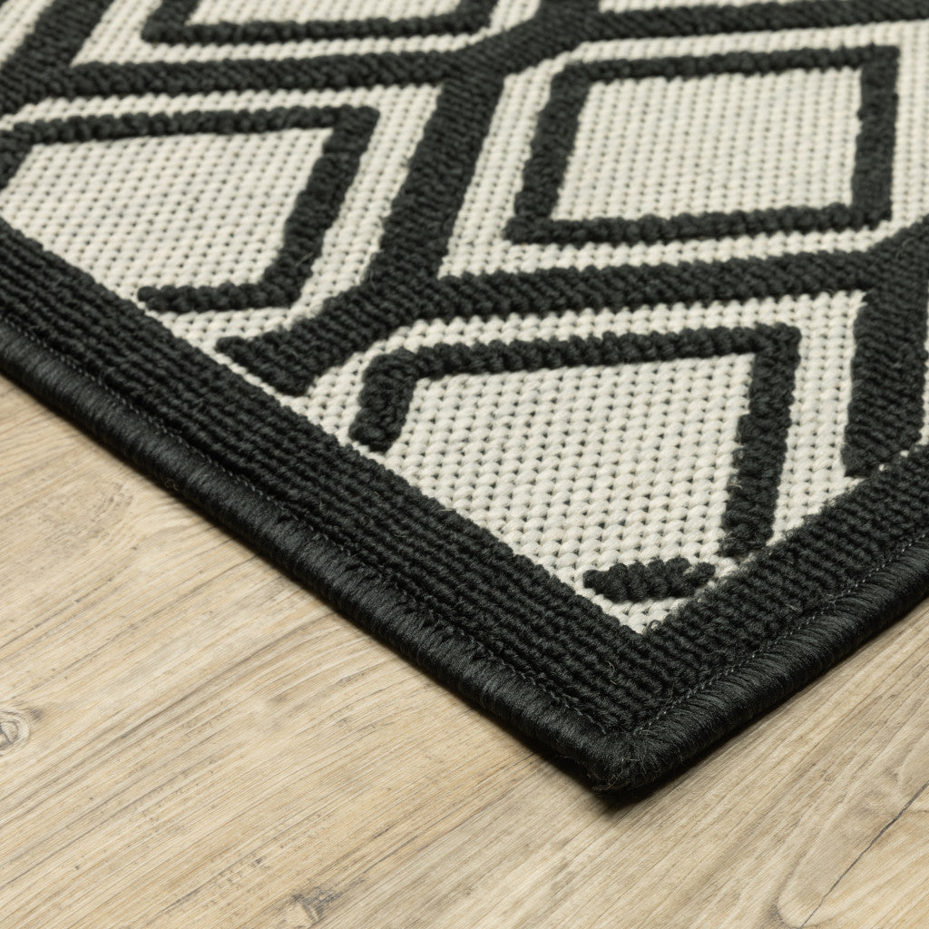 3' X 5' Beige and Black Geometric Stain Resistant Indoor Outdoor Area Rug