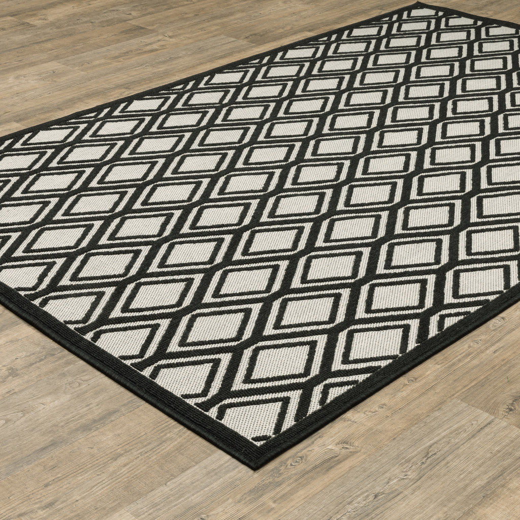 3' X 5' Beige and Black Geometric Stain Resistant Indoor Outdoor Area Rug