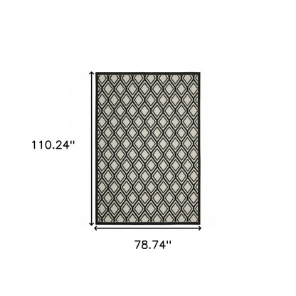 7' X 9' Beige and Black Geometric Stain Resistant Indoor Outdoor Area Rug