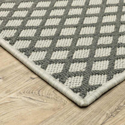 2' X 7' Beige Geometric Stain Resistant Indoor Outdoor Area Rug