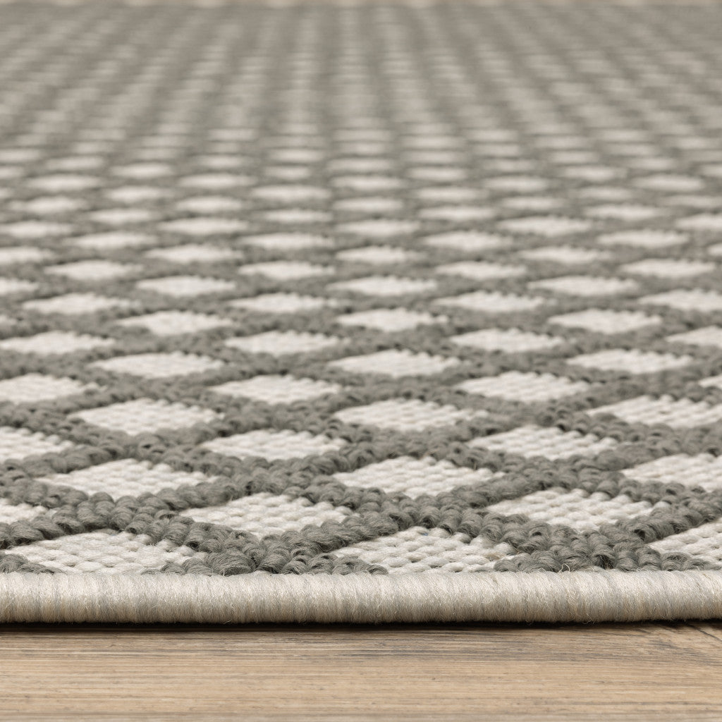 2' X 7' Beige Geometric Stain Resistant Indoor Outdoor Area Rug