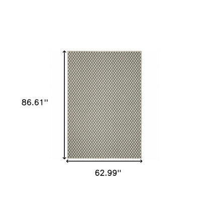 5' X 7' Beige Geometric Stain Resistant Indoor Outdoor Area Rug