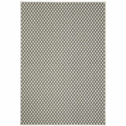 5' X 7' Beige Geometric Stain Resistant Indoor Outdoor Area Rug