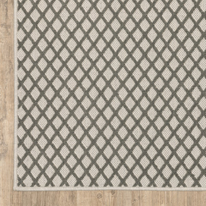 7' X 9' Beige Geometric Stain Resistant Indoor Outdoor Area Rug