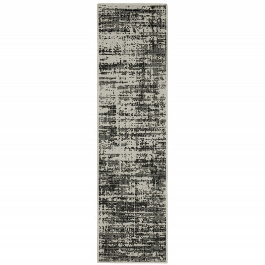 2' X 7' Beige and Black Abstract Stain Resistant Indoor Outdoor Area Rug