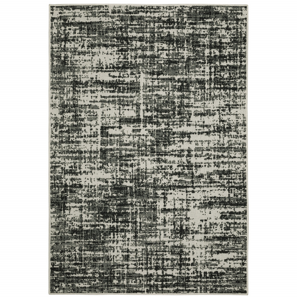 3' X 5' Beige and Black Abstract Stain Resistant Indoor Outdoor Area Rug