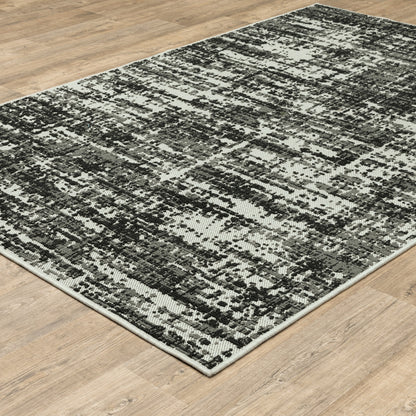 3' X 5' Beige and Black Abstract Stain Resistant Indoor Outdoor Area Rug