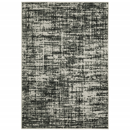 7' X 9' Beige and Black Abstract Stain Resistant Indoor Outdoor Area Rug