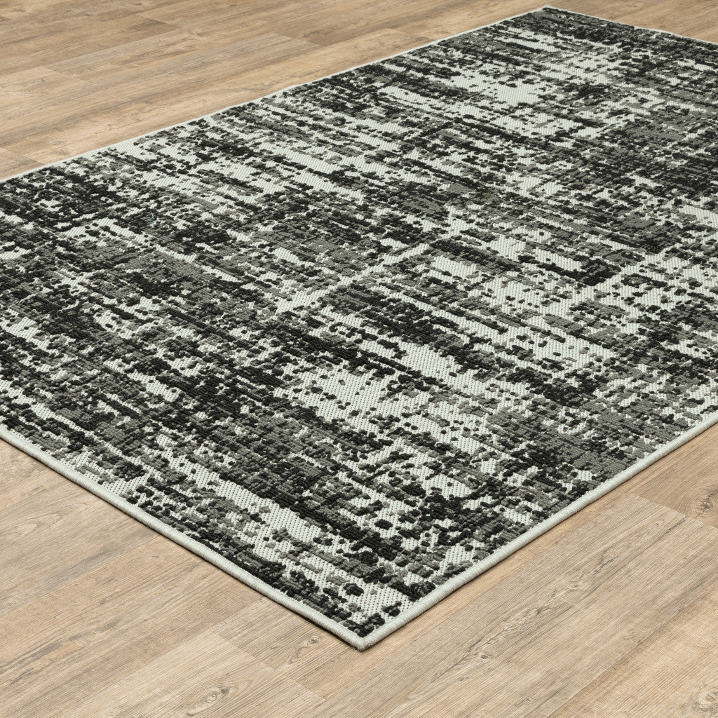 10' X 13' Beige and Black Abstract Stain Resistant Indoor Outdoor Area Rug