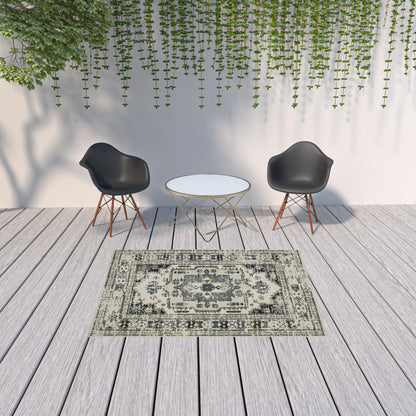 5' X 7' Blue and Beige Oriental Stain Resistant Indoor Outdoor Area Rug