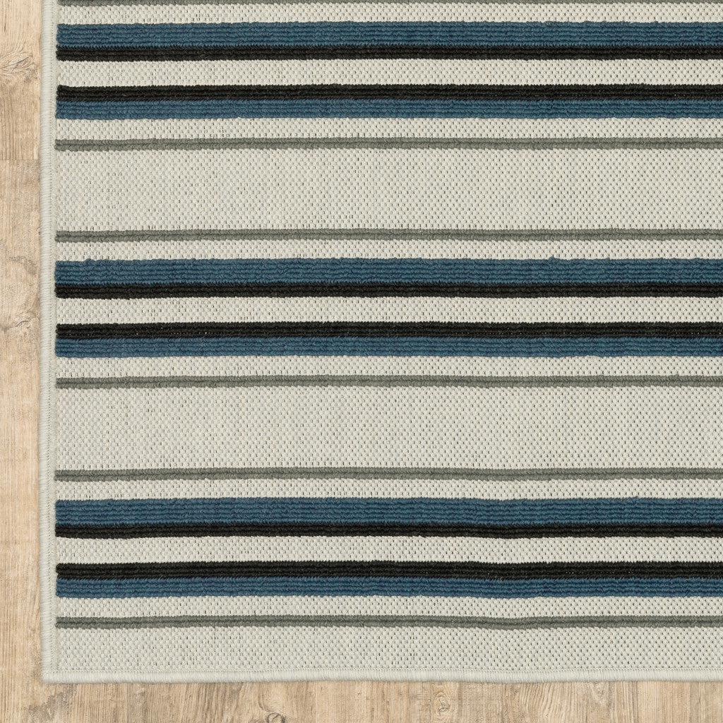 2' X 7' Blue and Beige Geometric Stain Resistant Indoor Outdoor Area Rug