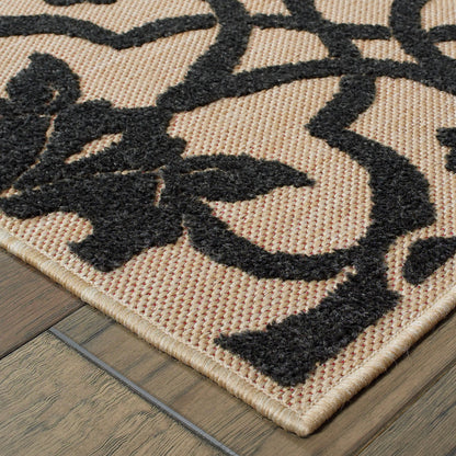 4' X 5' Beige and Black Oriental Stain Resistant Indoor Outdoor Area Rug