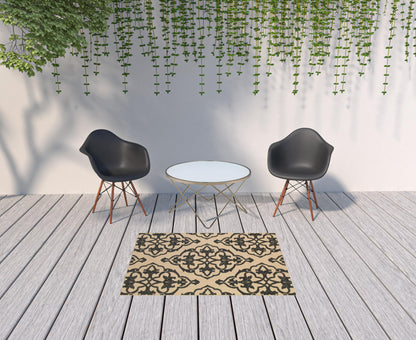 4' X 5' Beige and Black Oriental Stain Resistant Indoor Outdoor Area Rug