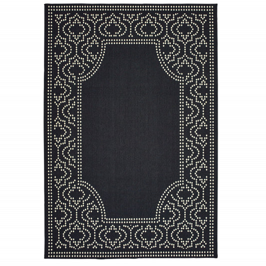 4' X 6' Black and Ivory Stain Resistant Indoor Outdoor Area Rug