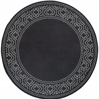 8' X 8' Black and Ivory Round Stain Resistant Indoor Outdoor Area Rug