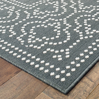 5' X 8' Gray and Ivory Stain Resistant Indoor Outdoor Area Rug