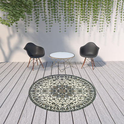 8' X 8' Ivory and Blue Round Oriental Stain Resistant Indoor Outdoor Area Rug