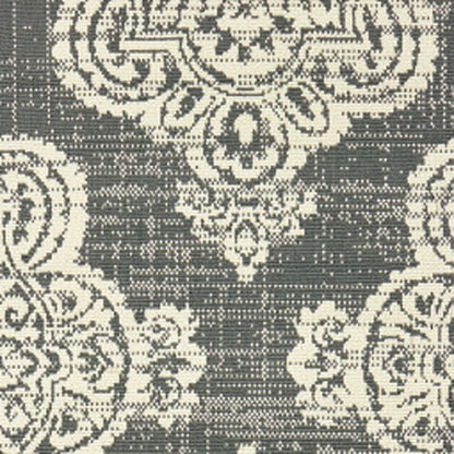 2' X 8' Gray and Ivory Oriental Stain Resistant Indoor Outdoor Area Rug