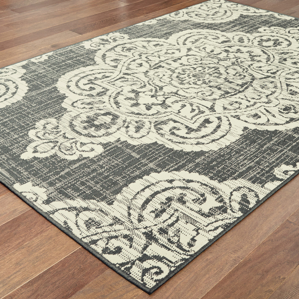 2' X 4' Gray and Ivory Oriental Stain Resistant Indoor Outdoor Area Rug