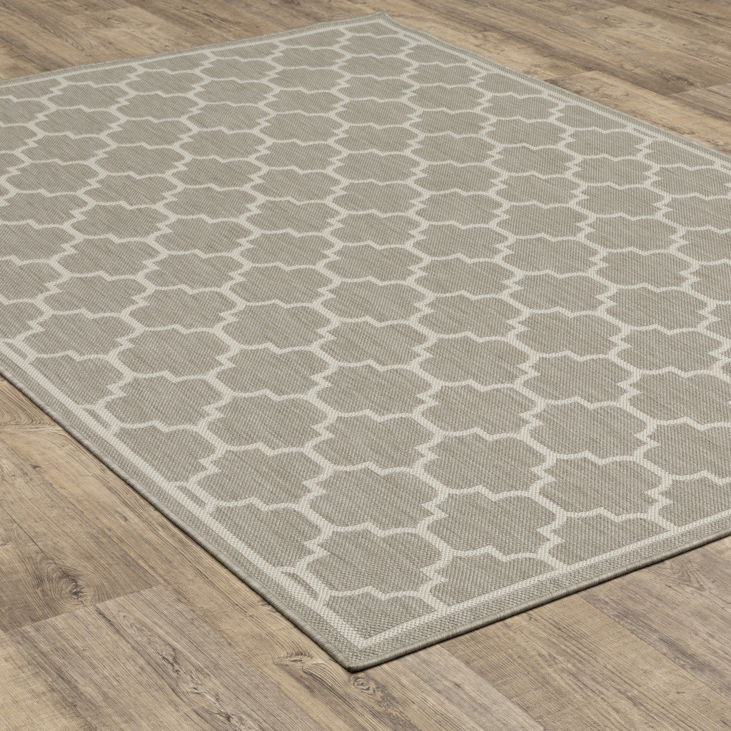 7' X 9' Gray and Ivory Geometric Stain Resistant Indoor Outdoor Area Rug