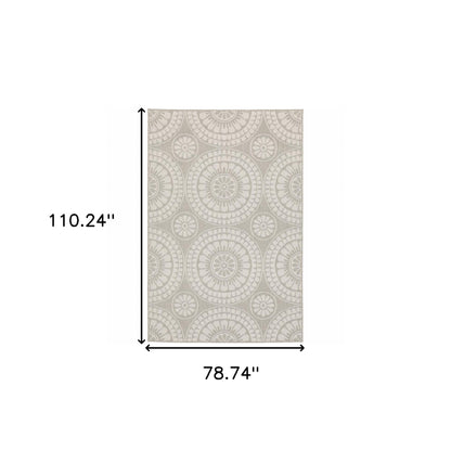 7' X 9' Gray and Ivory Geometric Stain Resistant Indoor Outdoor Area Rug