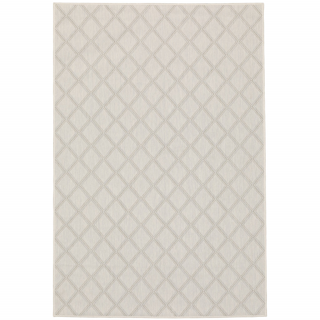 7' X 9' Gray and Ivory Geometric Stain Resistant Indoor Outdoor Area Rug