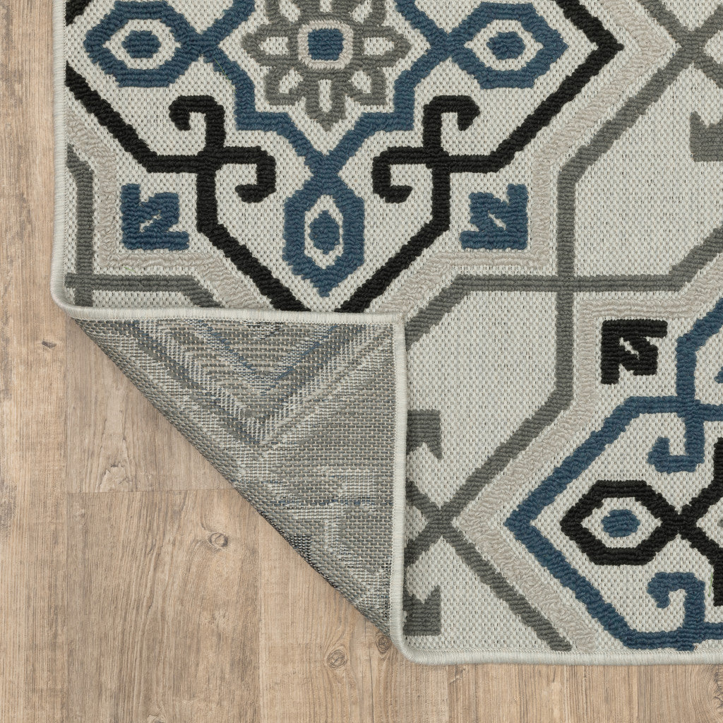 2' X 4' Blue and Beige Oriental Stain Resistant Indoor Outdoor Area Rug