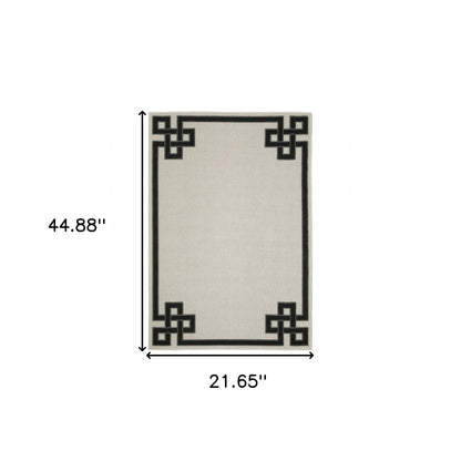 2' X 4' Beige and Black Stain Resistant Indoor Outdoor Area Rug