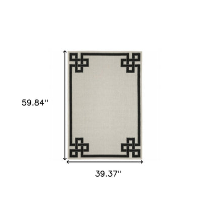 3' X 5' Beige and Black Stain Resistant Indoor Outdoor Area Rug