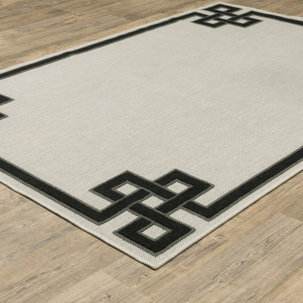 3' X 5' Beige and Black Stain Resistant Indoor Outdoor Area Rug