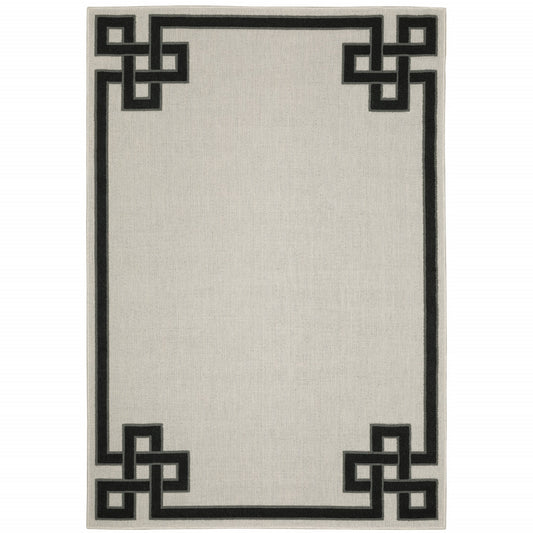 5' X 7' Beige and Black Stain Resistant Indoor Outdoor Area Rug