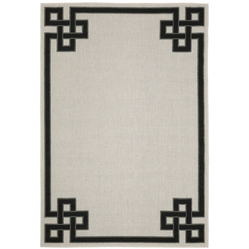 7' X 9' Beige and Black Stain Resistant Indoor Outdoor Area Rug