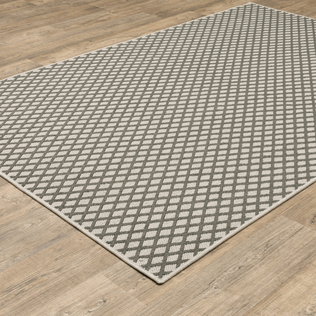 2' X 4' Beige Geometric Stain Resistant Indoor Outdoor Area Rug