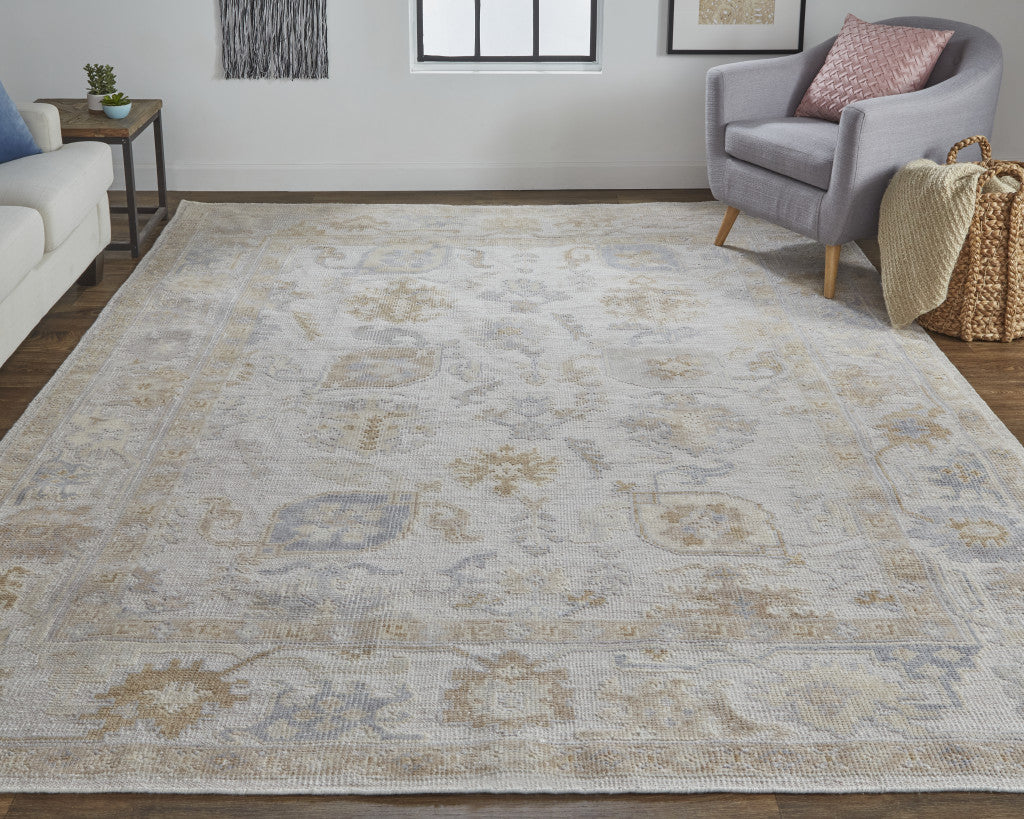 2' X 3' Ivory and Tan Medallion Handmade Distressed Indoor Outdoor Area Rug