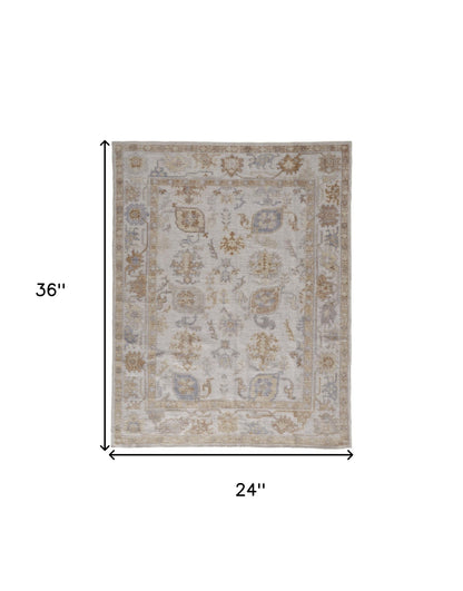 2' X 3' Ivory and Tan Medallion Handmade Distressed Indoor Outdoor Area Rug