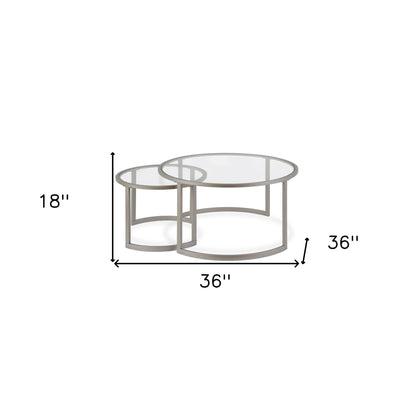 Set of Two 36" Nickel Glass And Steel Round Nested Coffee Tables