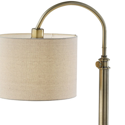 32" Antiqued Brass Metal Adjustable Arched Lamp With Beige Drum Shade