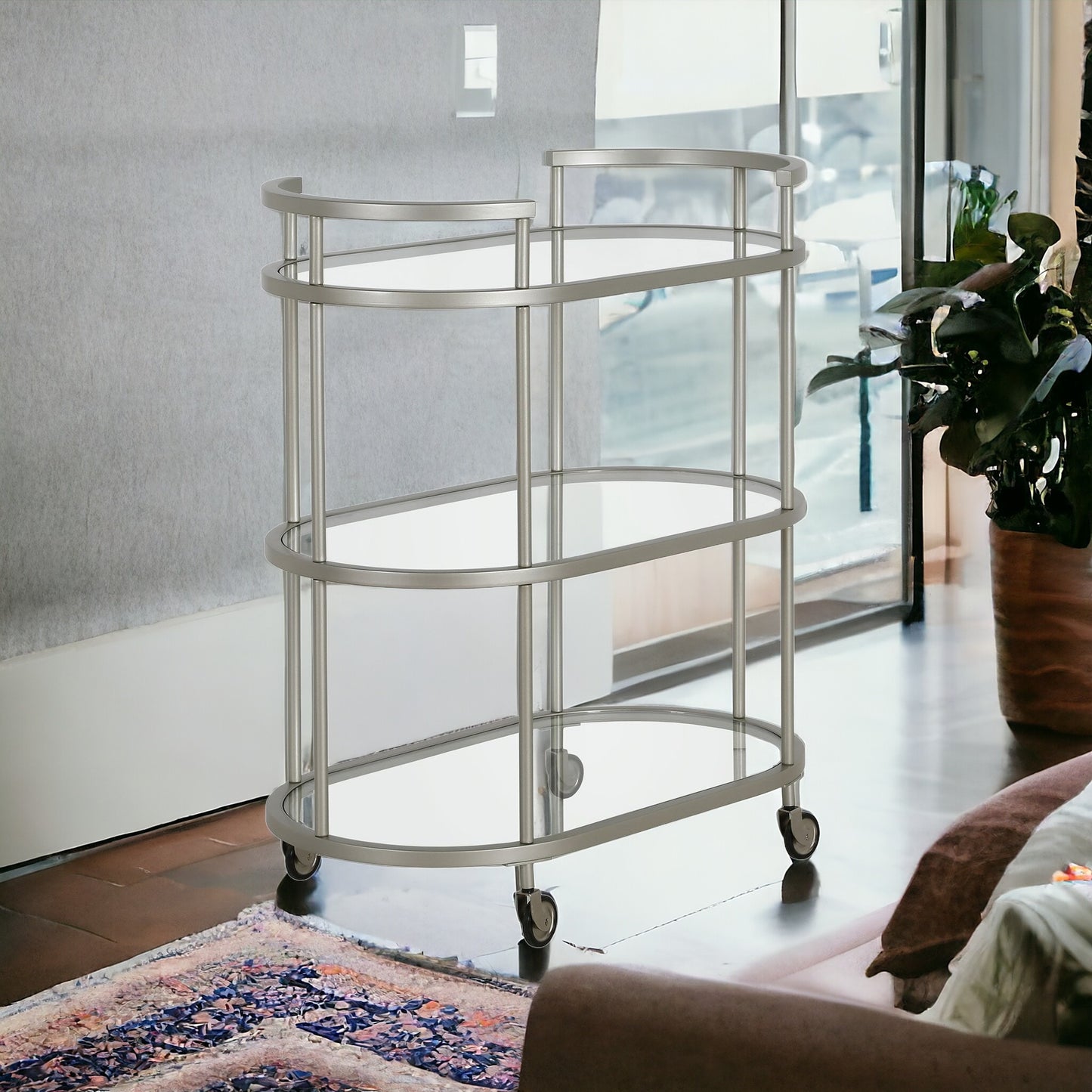 Nickel Steel And Glass Oval Rolling Bar Cart