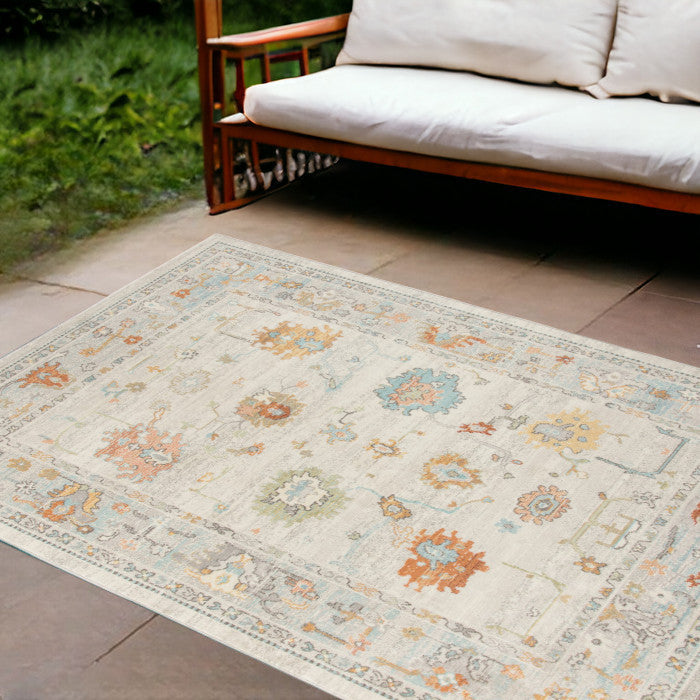 8' X 10' Gray and Orange Floral Stain Resistant Indoor Outdoor Area Rug